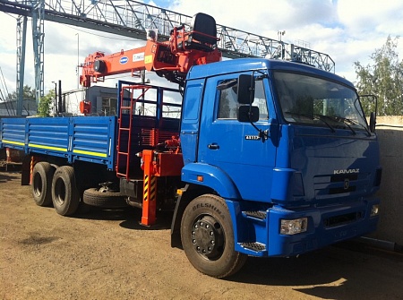 Бортовой КамАЗ 65117 с КМУ Бортовой КамАЗ 65117 с КМУ